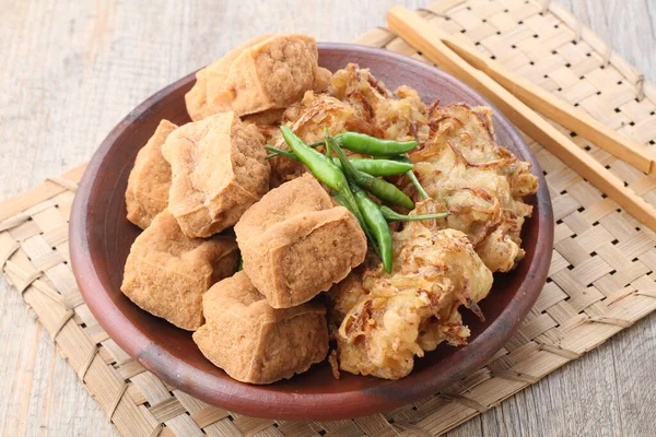 stock image Gorengan is (almost) always on the top list in Indonesia. Gorengan refers to fried snacks made of various ingredients coated with flour batter.