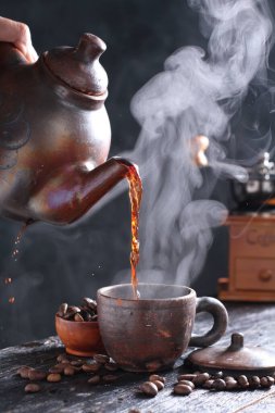 Coffee is a drink prepared from roasted coffee beans. Darkly colored, bitter, and slightly acidic, coffee has a stimulating effect on humans, primarily due to its caffeine content. It has the highest sales in the world market for hot drinks.