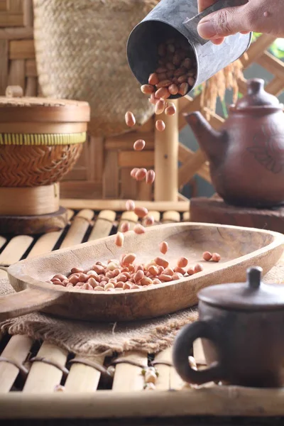 stock image coffee beans in a clay pot