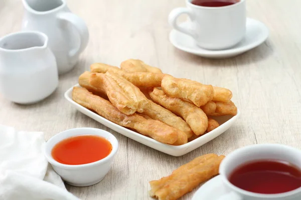 stock image Cakwe is one of the traditional Chinese confectionary. Cakwe is a Hokkien dialect meaning fried ghost, The name is closely related to the origin of this small but historically loaded confectionery.