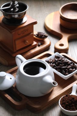 Coffee is a drink prepared from roasted coffee beans. Darkly colored, bitter, and slightly acidic, coffee has a stimulating effect on humans, primarily due to its caffeine content. It has the highest sales in the world market for hot drinks.