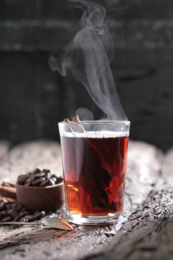 Tea is an aromatic beverage prepared by pouring hot or boiling water over cured or fresh leaves of Camellia sinensis, an evergreen shrub native to East Asia which probably originated in the borderlands of southwestern China and northern Myanmar.