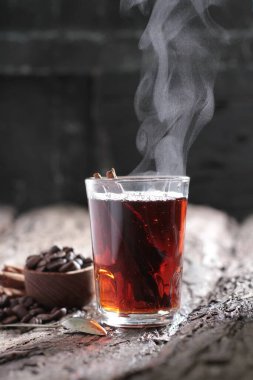 Tea is an aromatic beverage prepared by pouring hot or boiling water over cured or fresh leaves of Camellia sinensis, an evergreen shrub native to East Asia which probably originated in the borderlands of southwestern China and northern Myanmar.