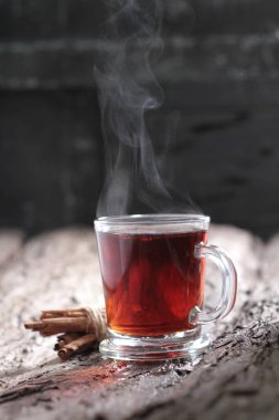 Tea is an aromatic beverage prepared by pouring hot or boiling water over cured or fresh leaves of Camellia sinensis, an evergreen shrub native to East Asia which probably originated in the borderlands of southwestern China and northern Myanmar.