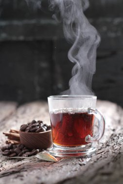 Tea is an aromatic beverage prepared by pouring hot or boiling water over cured or fresh leaves of Camellia sinensis, an evergreen shrub native to East Asia which probably originated in the borderlands of southwestern China and northern Myanmar.