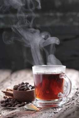 Tea is an aromatic beverage prepared by pouring hot or boiling water over cured or fresh leaves of Camellia sinensis, an evergreen shrub native to East Asia which probably originated in the borderlands of southwestern China and northern Myanmar.
