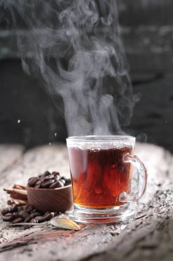Tea is an aromatic beverage prepared by pouring hot or boiling water over cured or fresh leaves of Camellia sinensis, an evergreen shrub native to East Asia which probably originated in the borderlands of southwestern China and northern Myanmar.