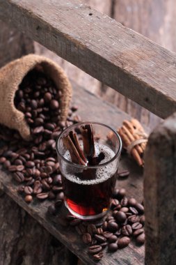 Coffee is a drink prepared from roasted coffee beans. Darkly colored, bitter, and slightly acidic, coffee has a stimulating effect on humans, primarily due to its caffeine content. It has the highest sales in the world market for hot drinks.