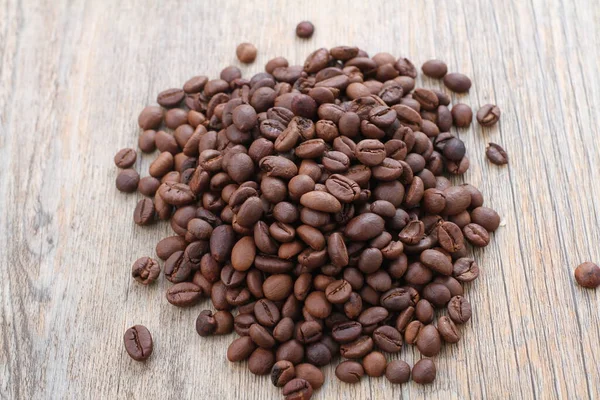 Kaffeebohnen Auf Holzgrund — Stockfoto