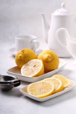 lemon tea in a cup on a white background