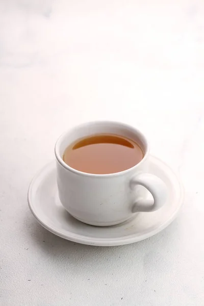 stock image cup of black tea on white background 