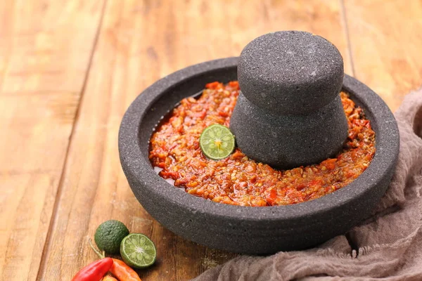 stock image bowl of red hot chili pepper on wooden background