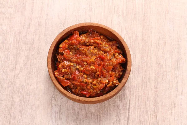 stock image red tomato sauce with spices and herbs