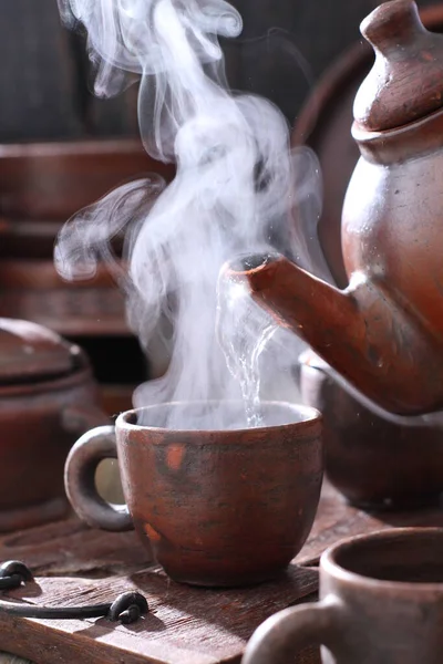 stock image tea ceremony, teapot and cups on wooden table 