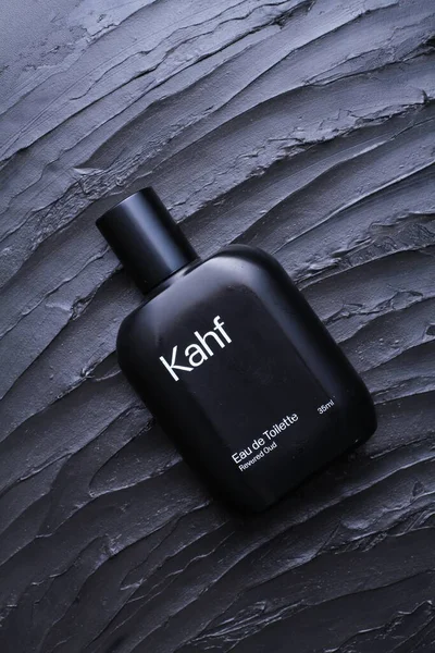men 's perfume with beautiful perfume on a black background