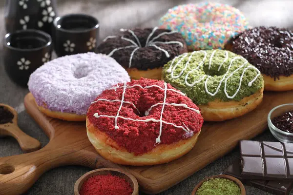 Delicious Donuts Icing Sugar Chocolate Sprinkles — Stock Photo, Image
