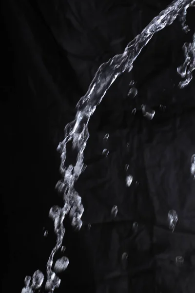 Water Spatten Zwarte Achtergrond — Stockfoto