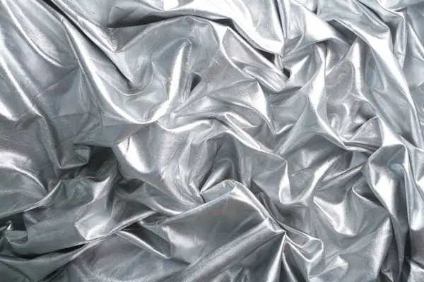 シルバーホイルの背景 光沢のある銀メタリックホイル 背景のための光沢のある質 光沢のある銀の質 — ストック写真