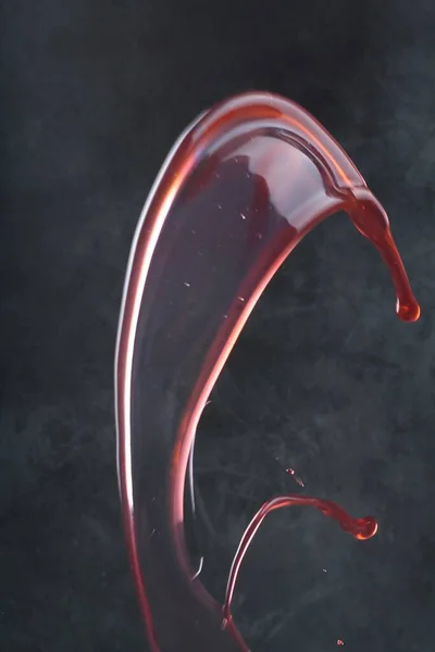 Splash Red Wine Glass — стоковое фото