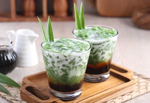 iced green milk with milk and mint leaves