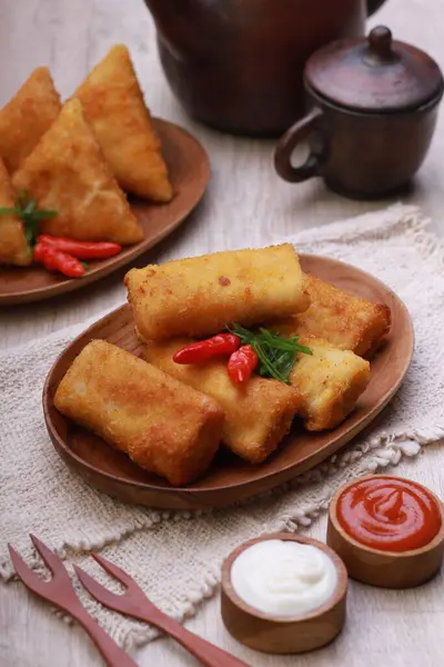 fried tofu and cheese with ketchup