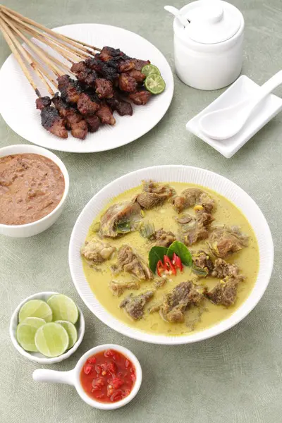 Goat curry is a traditional Indonesian dish made from lamb or goat meat cooked in a spicy, yellowish curry-like sauce called gulai.