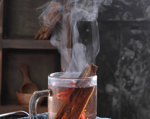 Glass Mug Cinnamon Sticks Spoon — Stock Photo, Image