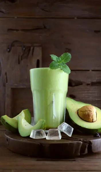 fresh green smoothie with avocado and lime