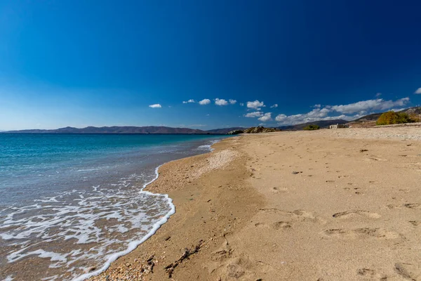 stock image The coast of the Greek island of Evia and beautiful sea views on a sunny day, blue sky with fantastic clouds, horizontal frame