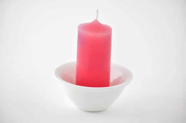 Red Candle White Plate Light Background — Stock Photo, Image