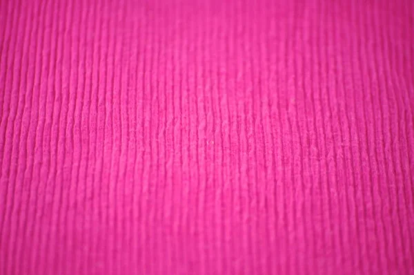 pink fabric background texture close up