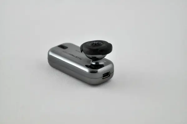 Closeup Shot White Smartphone Black Handle Light Background — Stock Photo, Image
