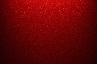 red glitter texture background with defocused pattern