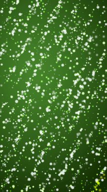 Snowy christmas background. Subtle flying snow flakes and stars on christmas green background. Delicate sweet snowy christmas. Vertical vector illustration. clipart