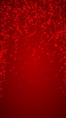 Sihirli kar yağışı arkaplanı. İnce uçan kar taneleri ve kırmızı arka plandaki yıldızlar. Sihirli yağan kar tatili manzarası. Dikey vektör illüstrasyonu.