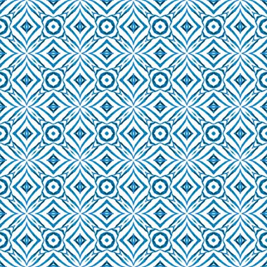 Suluboya madalyonu, kusursuz sınır. Mavi parlak boho şık yaz tasarımı. Madalyon pürüzsüz desen. Tekstil hazır kaliteli baskı, mayo kumaş, duvar kağıdı, ambalaj..