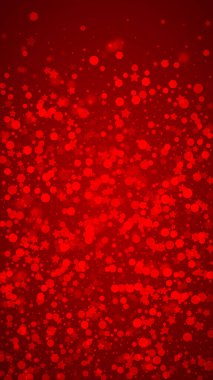 Sihirli kar yağışı arkaplanı. İnce uçan kar taneleri ve kırmızı arka plandaki yıldızlar. Sihirli yağan kar tatili manzarası. Dikey vektör illüstrasyonu.