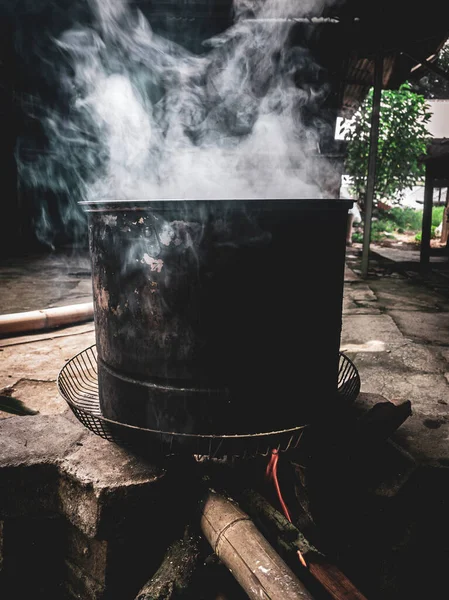 Stock image cooking pot on a fire in the kitchen