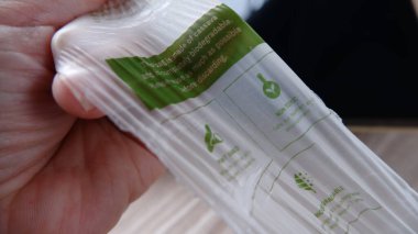 plastic strength test made of plant based cassava. Biodegradable plastic bag. Jakarta, 20 january 2022. clipart