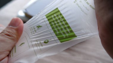 plastic strength test made of plant based cassava. Biodegradable plastic bag. Jakarta, 20 january 2022.