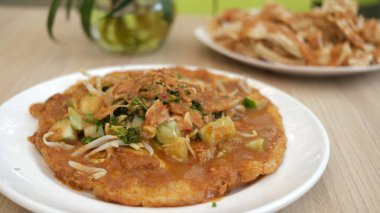 Tahu Telor or Egg Tofu is a traditional food from Surabaya city. Indonesia food.