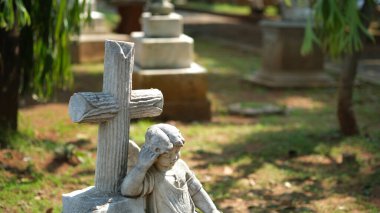the tombstone of the cross-shaped stone in the cemetery. Prasasti Museum, Jakarta. 18 April 2022.