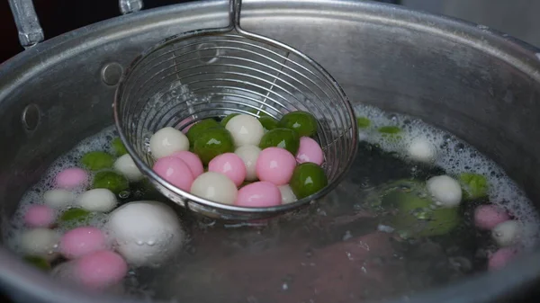 stock image Tangyuan are a traditional Chinese dessert made of glutinous rice shaped into balls that are served in a hot broth or syrup