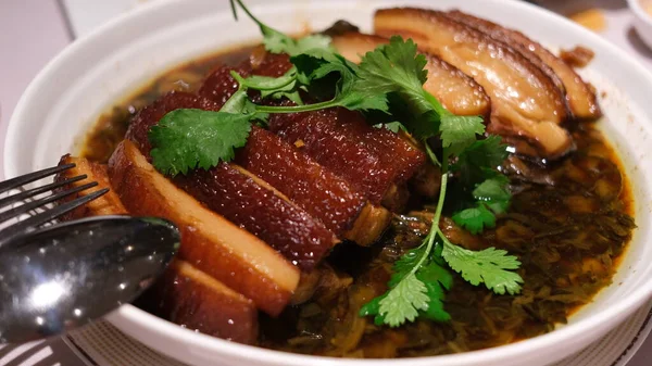 stock image Pork Belly with preserved Mustard vegetables and dark soy sauce. Chinese food.