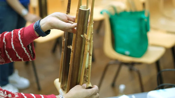 The angklung is a musical instrument from the Sundanese people in Indonesia made of a varying number of bamboo tubes attached to a bamboo frame.