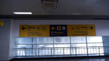 A sign to Airport train at Jakarta. Manggarai Station, 9 October 2024.  clipart