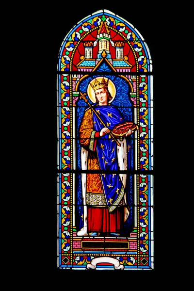 stock image Stained glass window from the Sainte-Trinit church in Coulon, built in 830