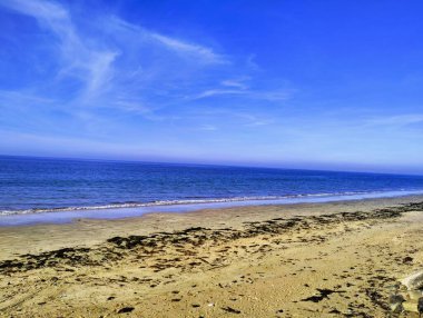 a beautiful seascape with a view of the beach