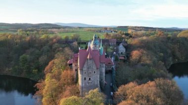 drone flight over old medieval castle, beautiful view of nature, golden hour