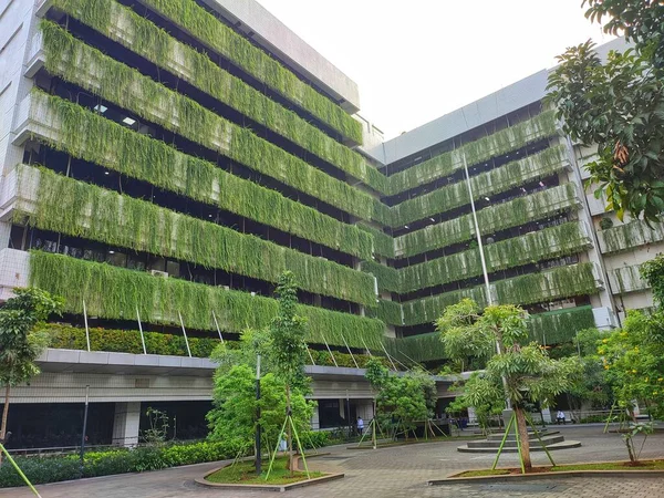 stock image Jakarta, Indonesia - May 25, 2023 : public works ministry office building with courtyard and green trees with go green concept